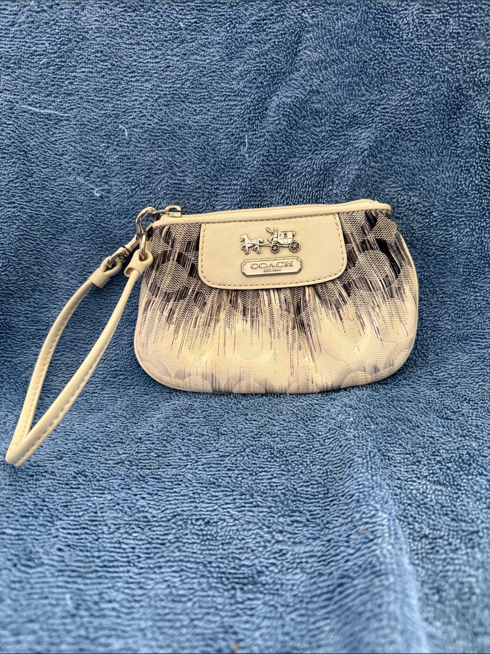 COACH Adorable Beige and Brown Signature Wristlet with Horse & Carriage Plaque